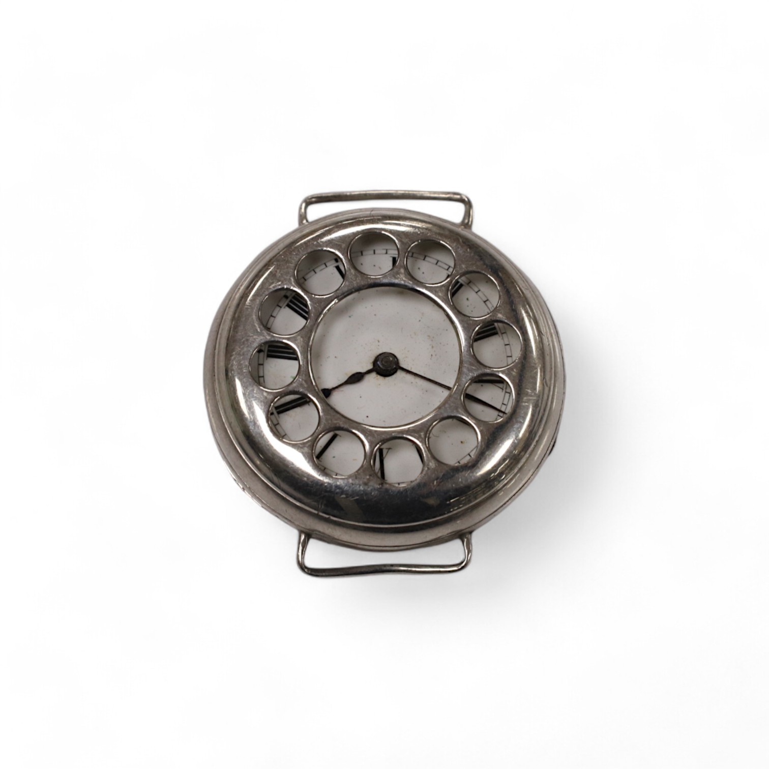 A George V silver manual wind trench watch with 'telephone dial' shrapnel guard, case import marked for London, 1917, case diameter 35mm, lacking winding crown. No strap. Condition - poor